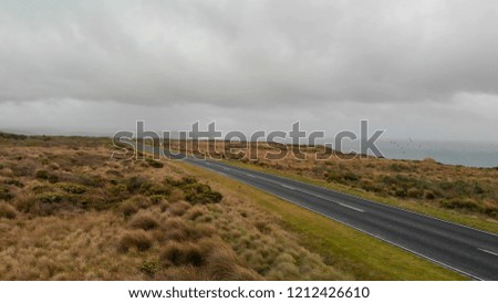 The Great Ocean Road on a stormy day. Twelve Apostles and coastline.