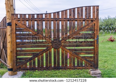 Old wooden village gate 