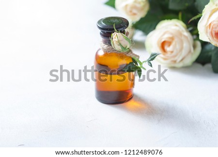 Roses aroma oil, spa and aromatherapy, selective focus