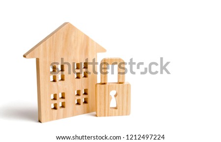 Wooden house padlock. The concept of protection of property and real estate, property rights. Installation of alarm systems and services of security agencies. Protecting home disasters and thieves.