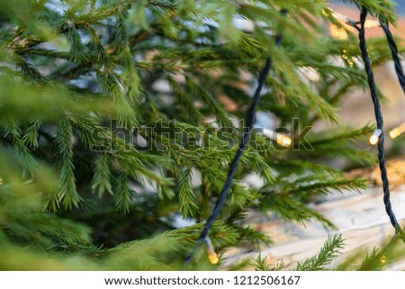 Colorful Christmas decorations on tree for festive background