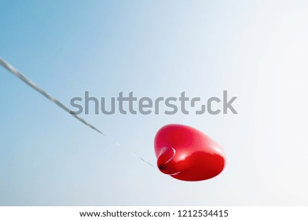 Heart shape balloon against blue sky. copyspace for your individual text.