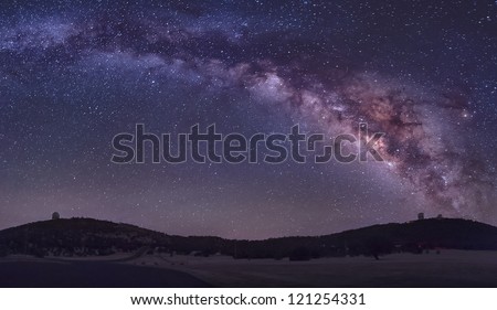 The summer Milky Way rises over the MacDonald Observatory near Fort Davis, Texas. Royalty-Free Stock Photo #121254331