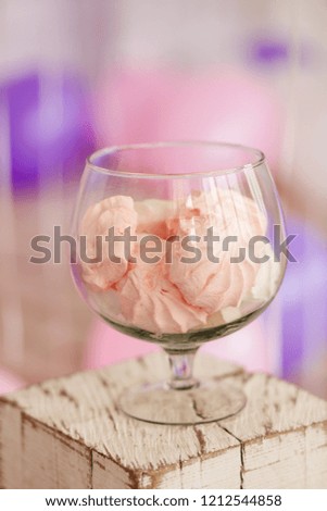 pink marshmallows in a beautiful glass glass, delicious food