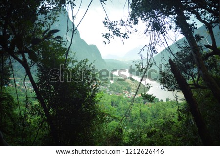 Foggy landscape of Muang ngoy village in Laos seen from the mountain view point