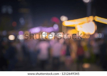 Blur background of People enjoy the food and drink at night market