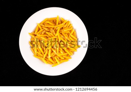 pasta in a bowl isolated on white, digital photo picture as a background