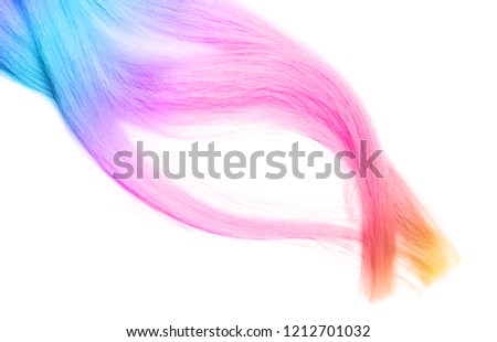 Colorful dyed hair on white background, top view. Trendy hairstyle