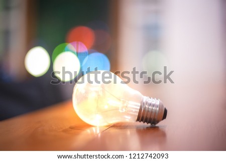 Abstract background of creative ideas concept from lightbulb and bokeh, Object design with grain texture