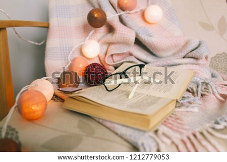 home background Beautiful accessory home decor and interior decoration 
beautiful plaid and book Glowing lamps in the house