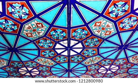 Blue, red, navy-blue, white colored traditional Islamic patterned ceramic in mosque decoration