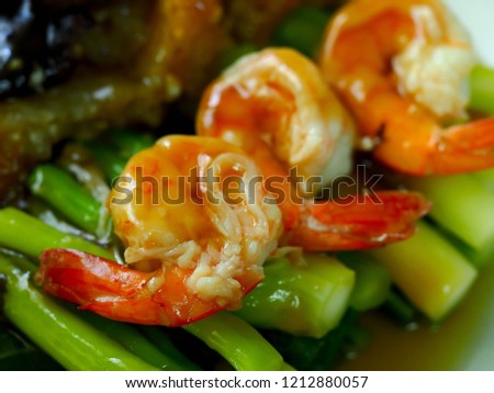 Stir fried Chinese Hong Kong kale with shrimp in oyster sauce. Chinese food.