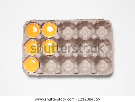High angle studio shot of eggs in box