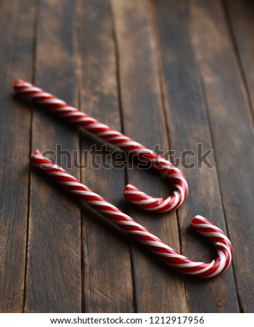 Christmas candy cane on dark background