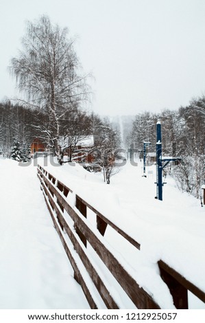 Ski resort and cable car winter road, camping, winter landscape
