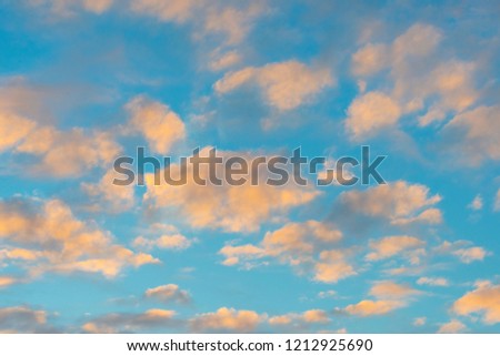 White clouds in a blue sky at fall