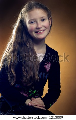 headshot of a smiling pretty girl