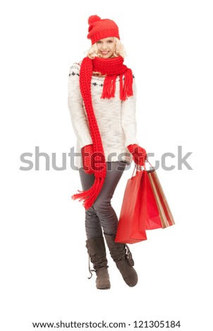 picture of  young girl with shopping bags..