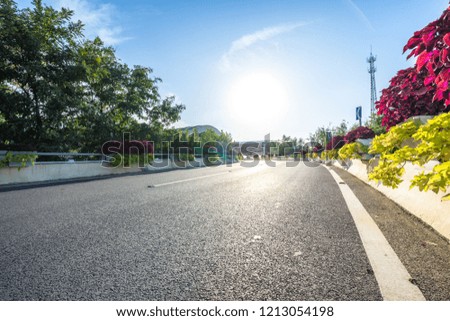 empty asphalt road with city skyline in wuhan china