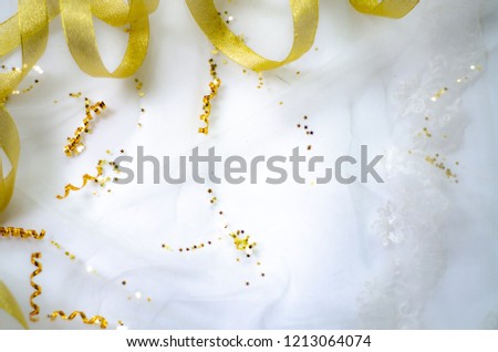 Golden ribbon on a white background.Coppy space.
