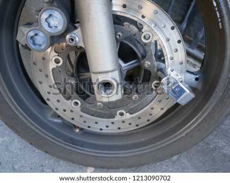 Brakes Close Up on a Motorcycle in the Street