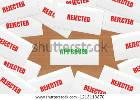 Many red rejected letters and one green special approved ink stamp latter on wooden table background.