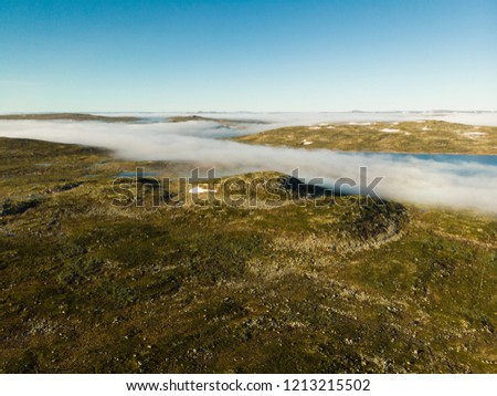 Hardangervidda mountain plateau landscape. National tourist Hardangervidda route. Norway in summer.