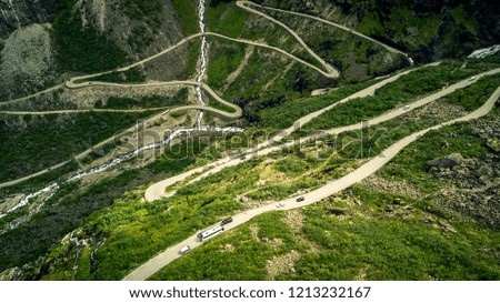 Aerial view from drone on mountain's, curvy road. Scenic panorama. Summer time. Norway.