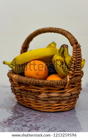 Fruits in a basket Royalty-Free Stock Photo #1213259596