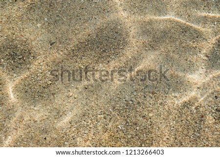 Clear transparent sea water, white and beach, natural marine background