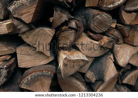 Stacked logs and firewood.