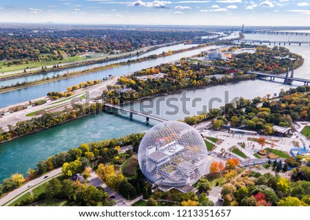 Montreal, Quebec, Canada, aerial view of Biosphere Environment Museum and Saint Lawrence river during fall season.