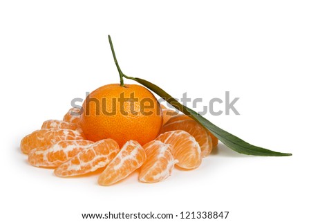 tangerine with leaves and slices isolated on white