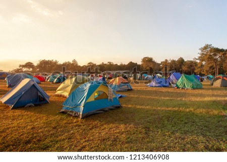 Camping area in the morning.Colorful tourist 's tents field. Winter is coming.