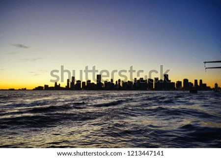 Sun set of Miami downtown, south beach and harbor of Florida from millionaire cruise