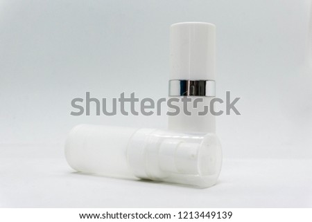 a white bottle sample for product packaging shoot in the mini lightbox