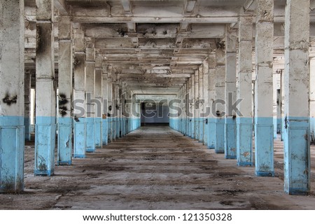 interior of an abandoned factory in Narva, Estonia Royalty-Free Stock Photo #121350328