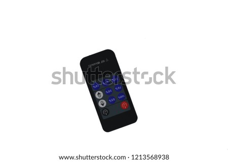 Black with buttons remote control on a white background
