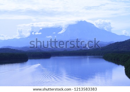 View of Mount Kinabalu from Mengkabong river. A place where photographers come to take sunset or sunrise pictures. people come here for fishing too