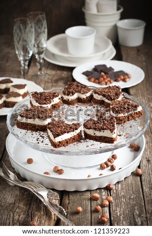  Biscuit Cake in the Shape of Heart with White Custard and Chocolate on Festive Wooden Table