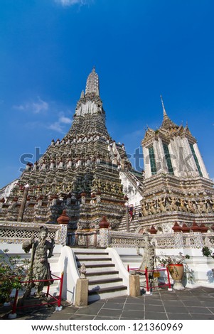 The Temple of Dawn Wat Arun and blue sky in Bangkok, Thailand