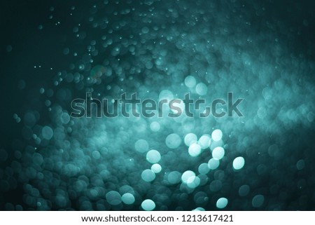 abstract dark turquoise background with soft blur bokeh light effect