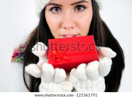 Young girl with red gift