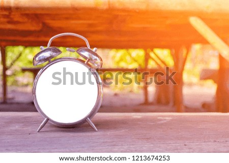 Clock mounted on a wooden platform in orange peel, planted clock to put pictures and text