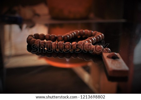 The holy Quran with tasbih/rosary beads Royalty-Free Stock Photo #1213698802