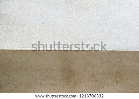 both side of cement wall.dirty and clean side.light and shadow.