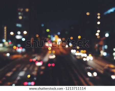 Blurred Tokyo traffic night light with urban bokeh