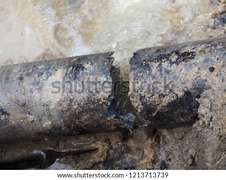 Crack at AC pipe Royalty-Free Stock Photo #1213713739