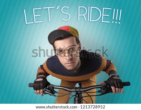 Kooky young guy on a bike with cyclist keywording and streaky background