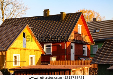 Golden Autumn in Lithuania - Picture of Trakai. Orange facade